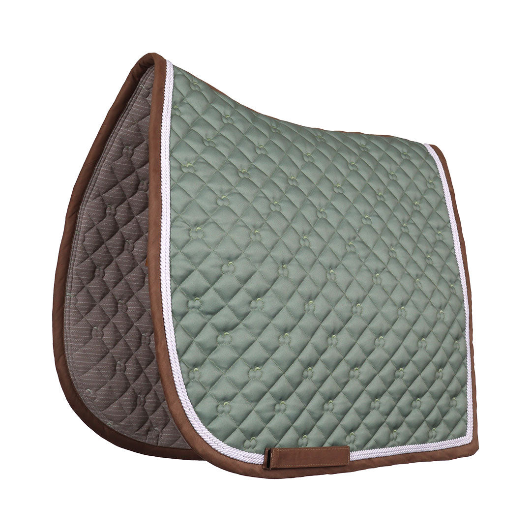 Green and brown quilted saddle pad on a white background