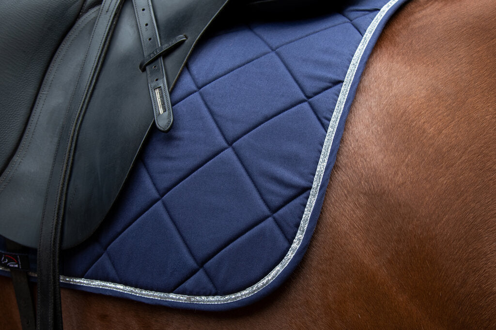 Colorful saddle pads for schooling, dressage, and everyday riding.