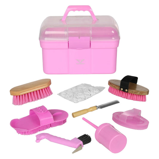 Pink grooming kit with various brushes and tools on a white background