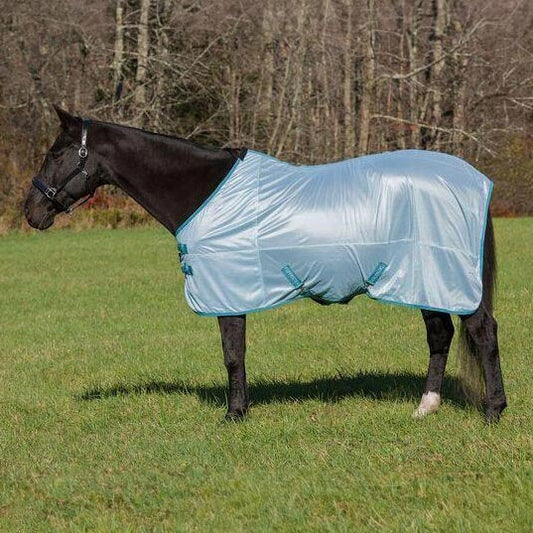 Horse wearing a light blue fly sheet in an outdoor setting with trees in the background