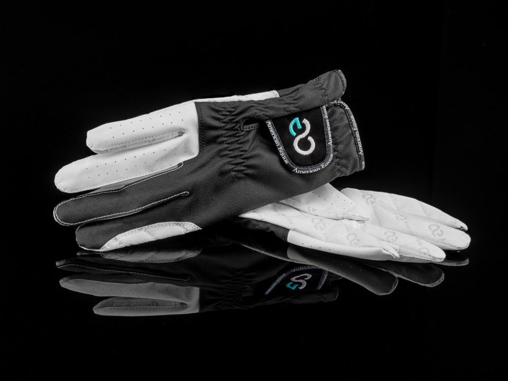 black and white riding gloves