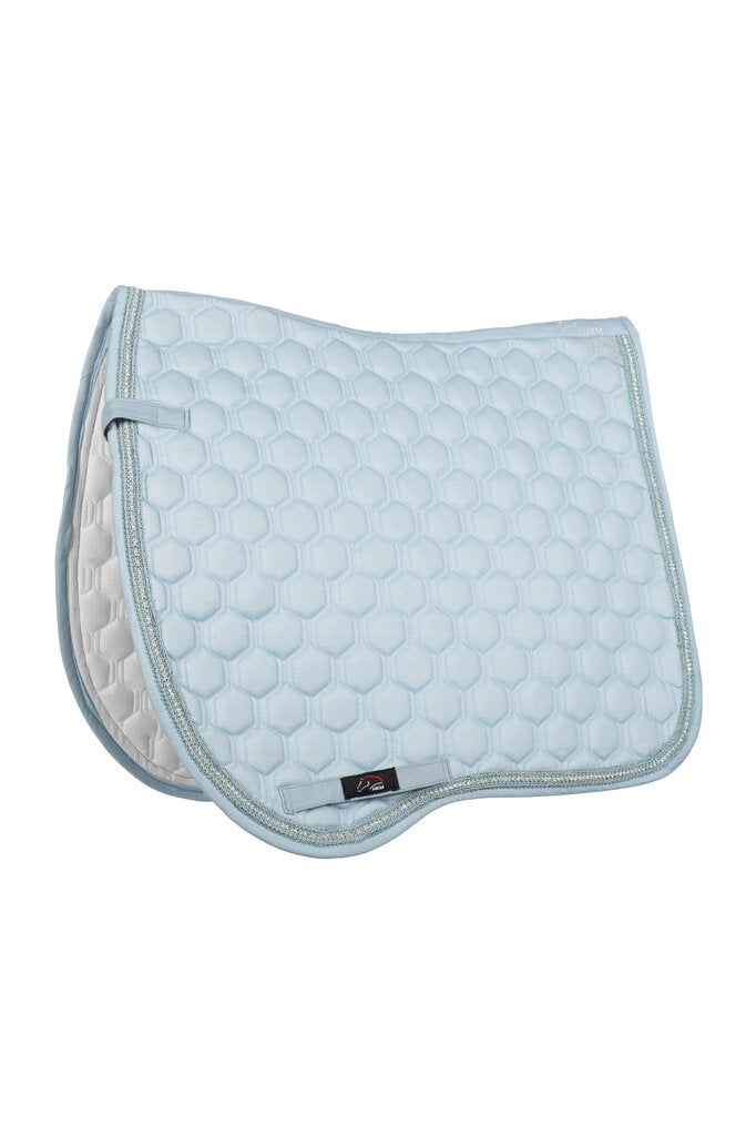 Light blue quilted saddle pad on a white background