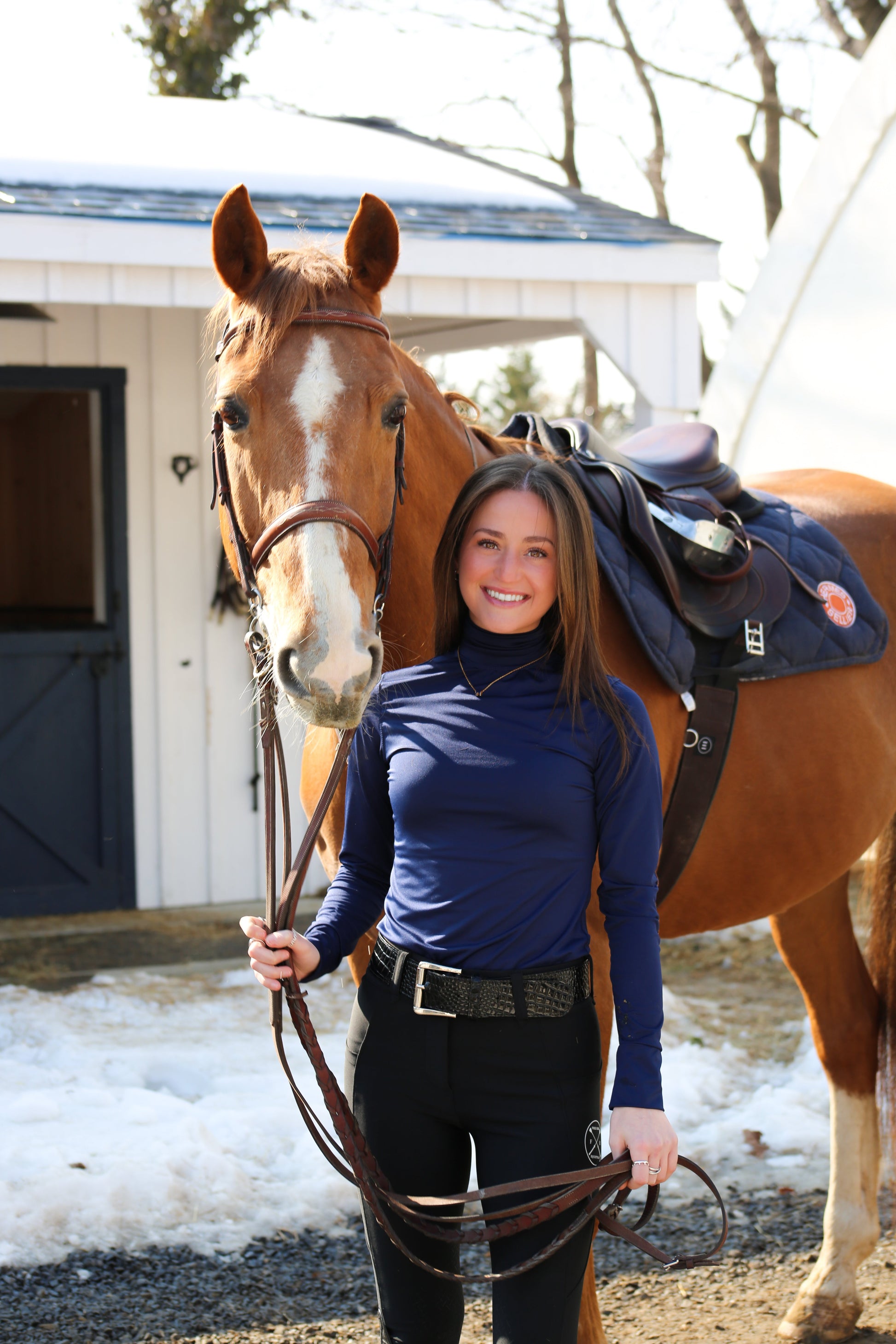 blue long sleeve riding top with sueded trim