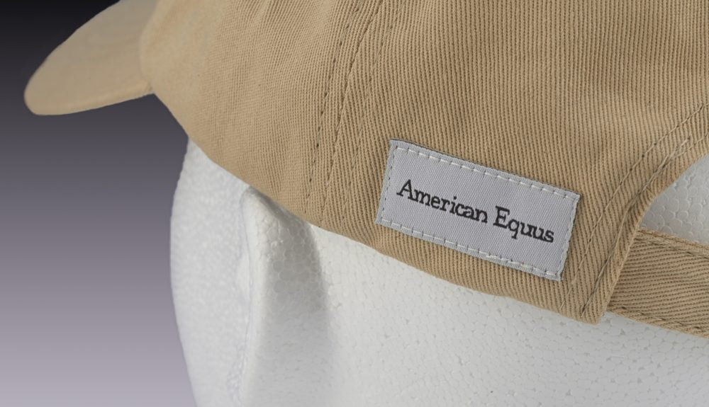 tan baseball cap with American Equus logo