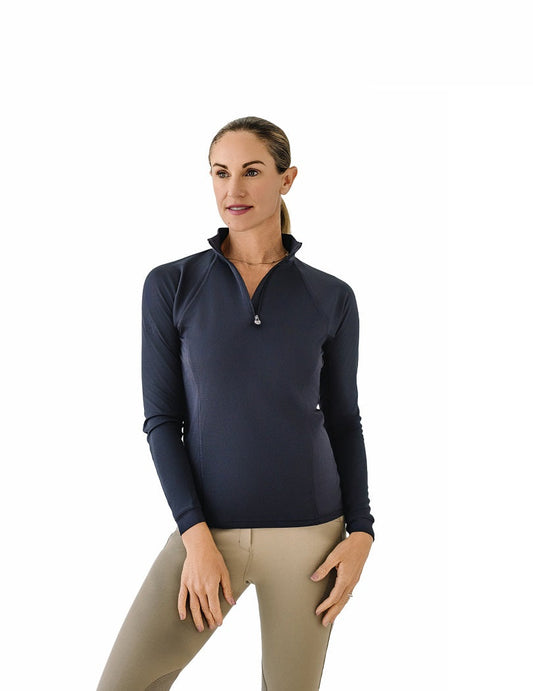 Woman wearing a navy long-sleeve shirt with a quarter-zip design on a white background
