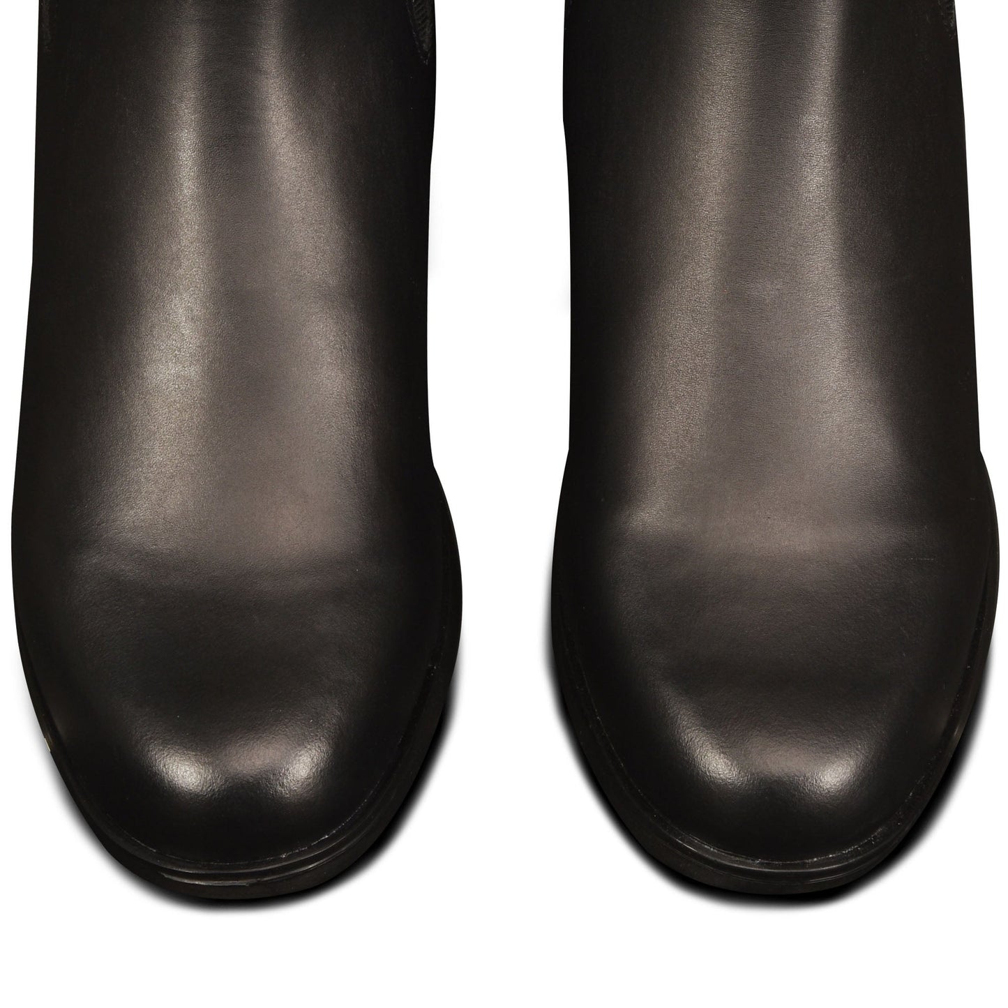 Pair of black leather shoes on a white background