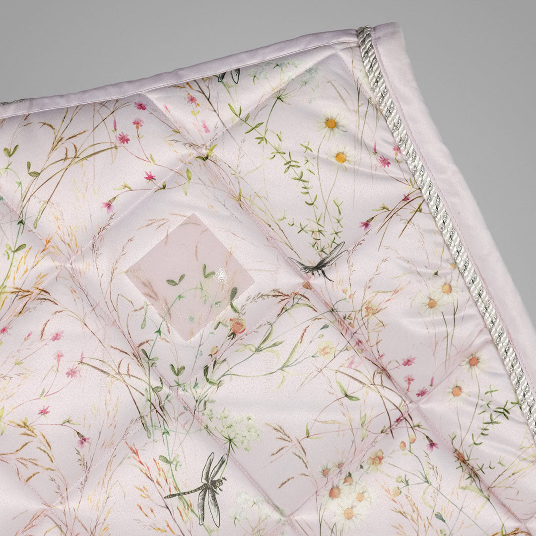 Quilted saddle pad with floral pattern 