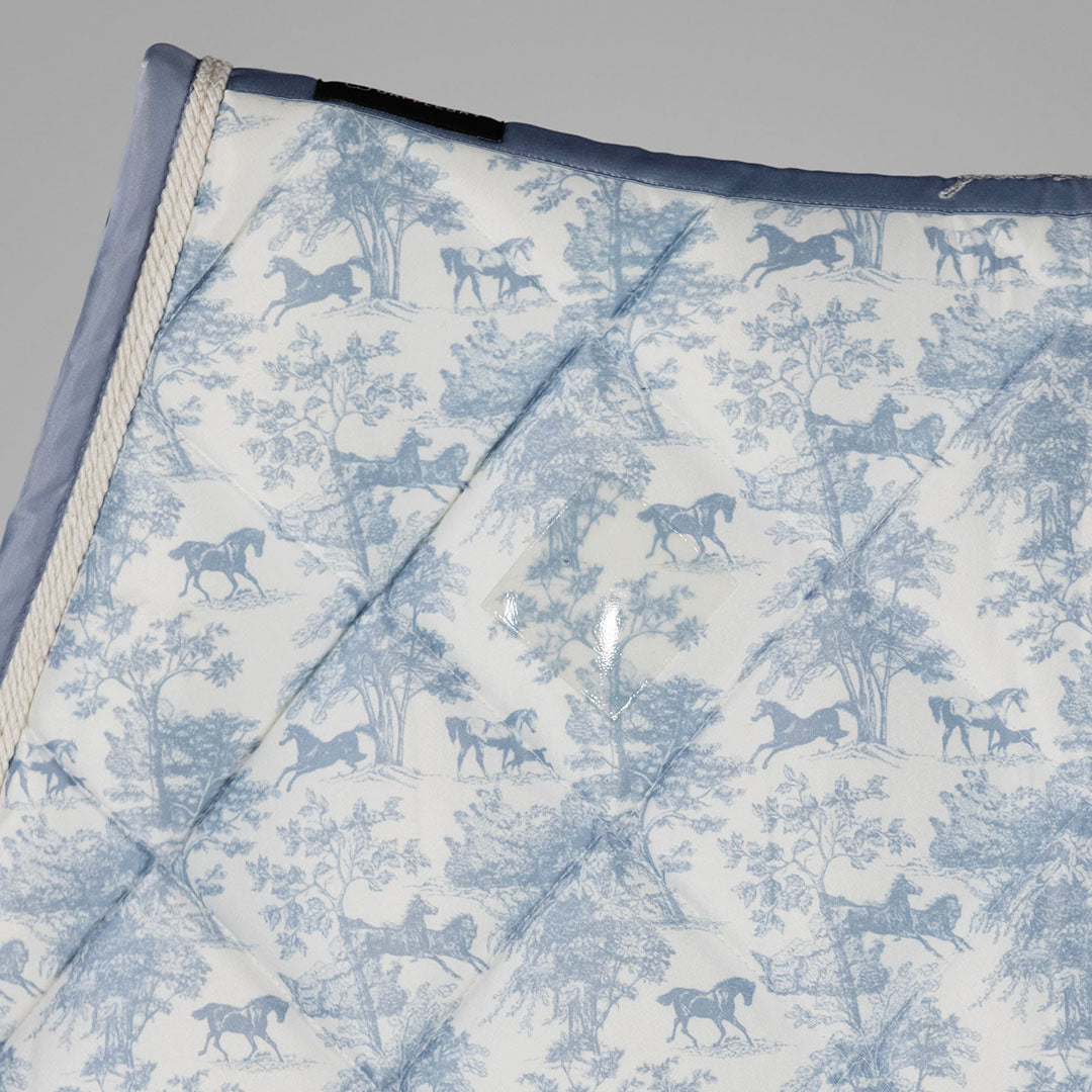 blue and white patterned saddle pad
