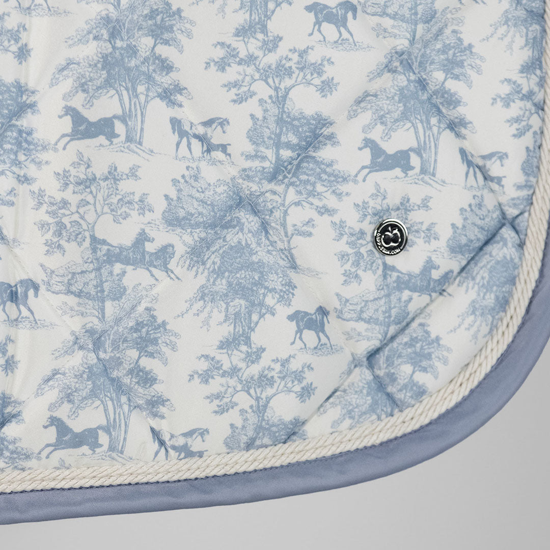 blue and white patterned saddle pad