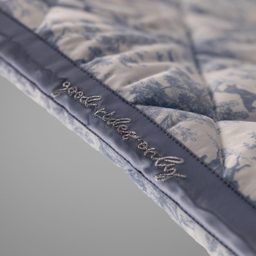 blue and white patterned saddle pad