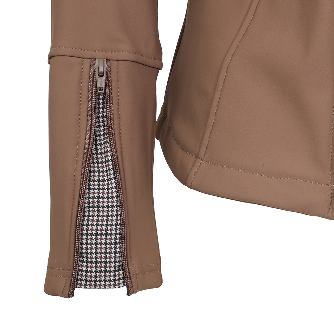 Close-up of a brown jacket with a houndstooth lining
