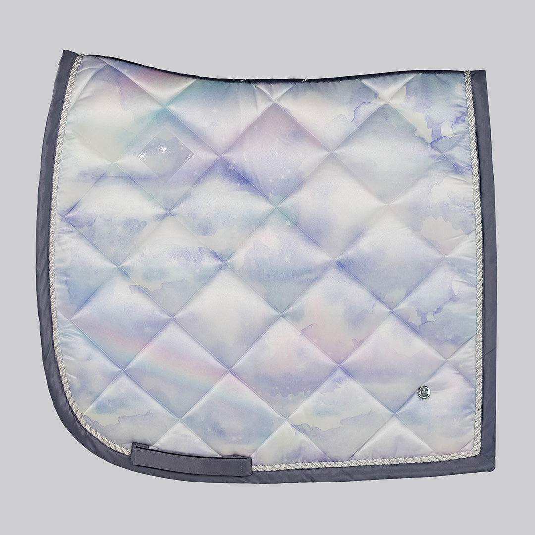 Quilted saddle pad with iridescent pattern on a gray background