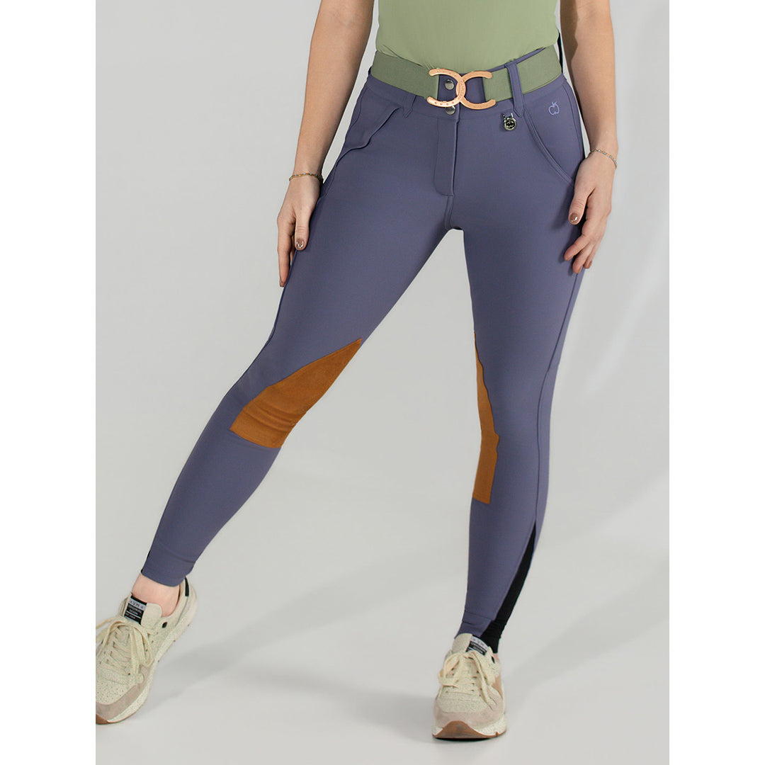 purple riding pants with a brown patch