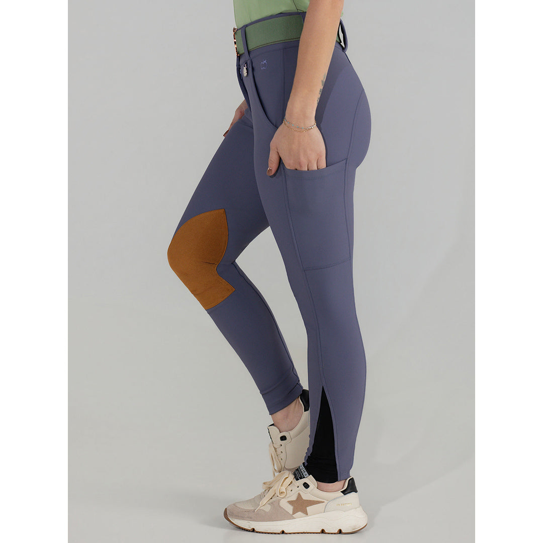purple riding pants with a brown patch