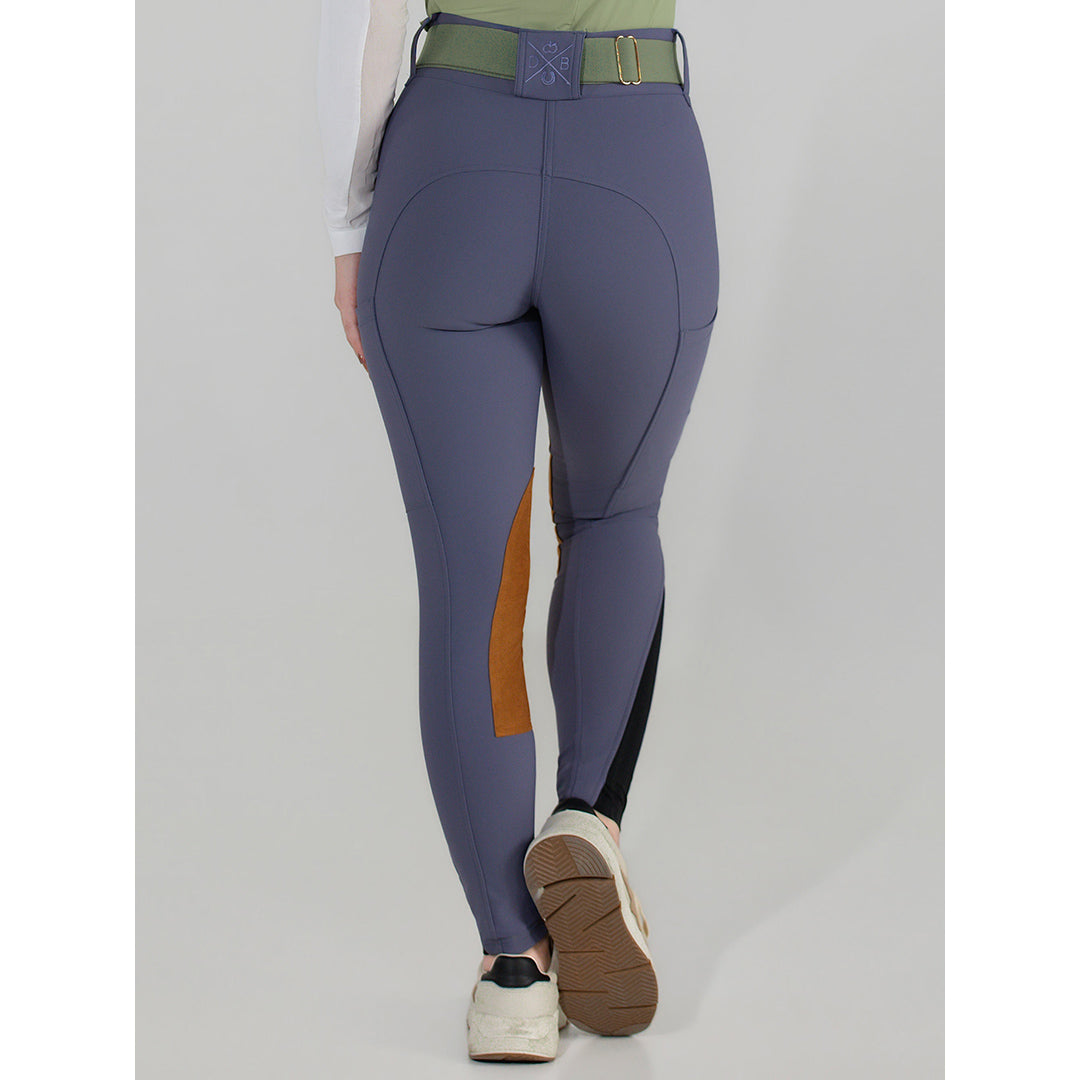 purple riding pants with a brown patch
