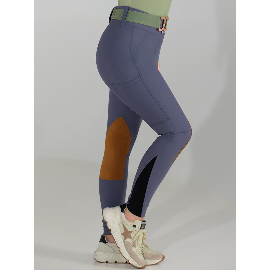purple riding pants with a brown patch