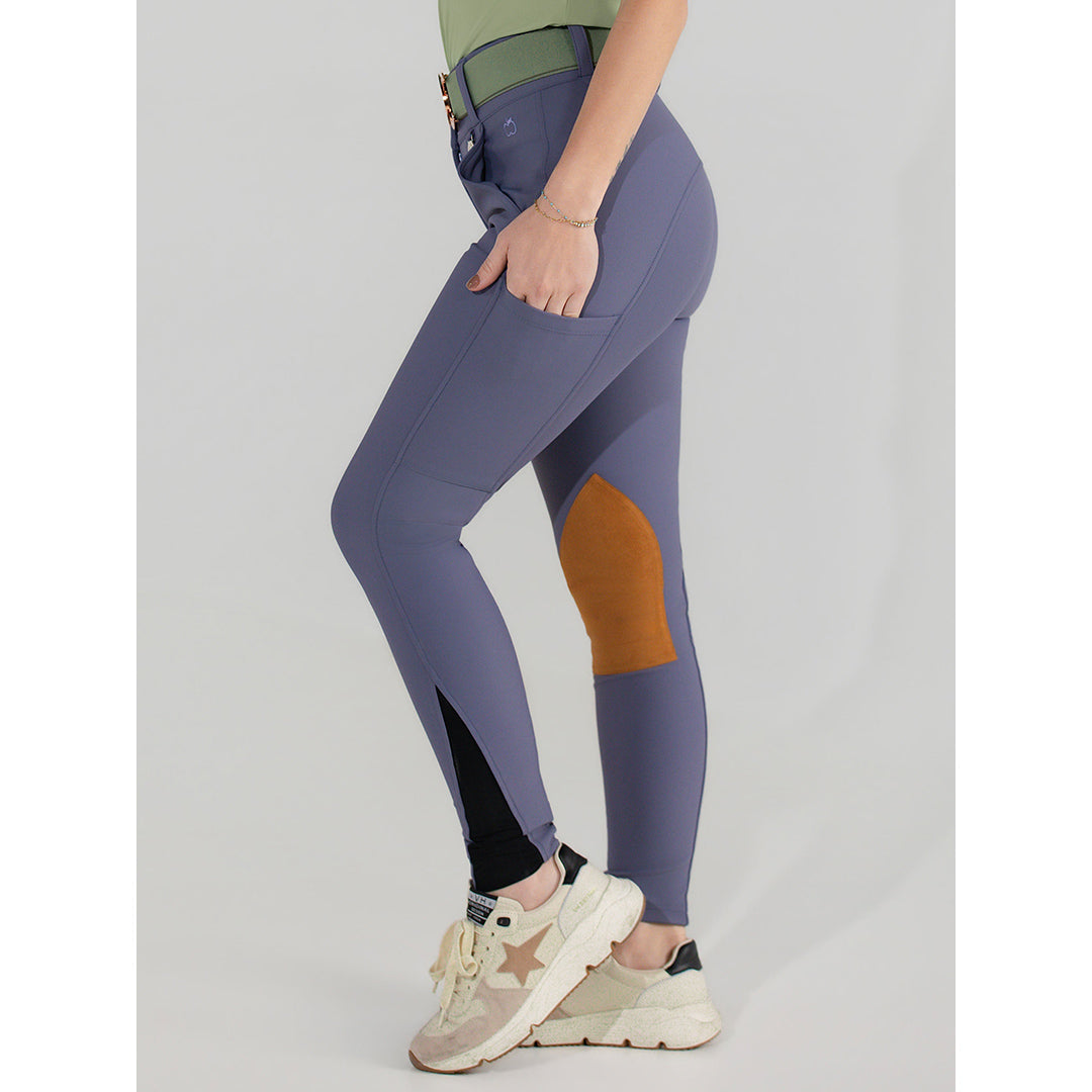 purple riding pants with a brown patch