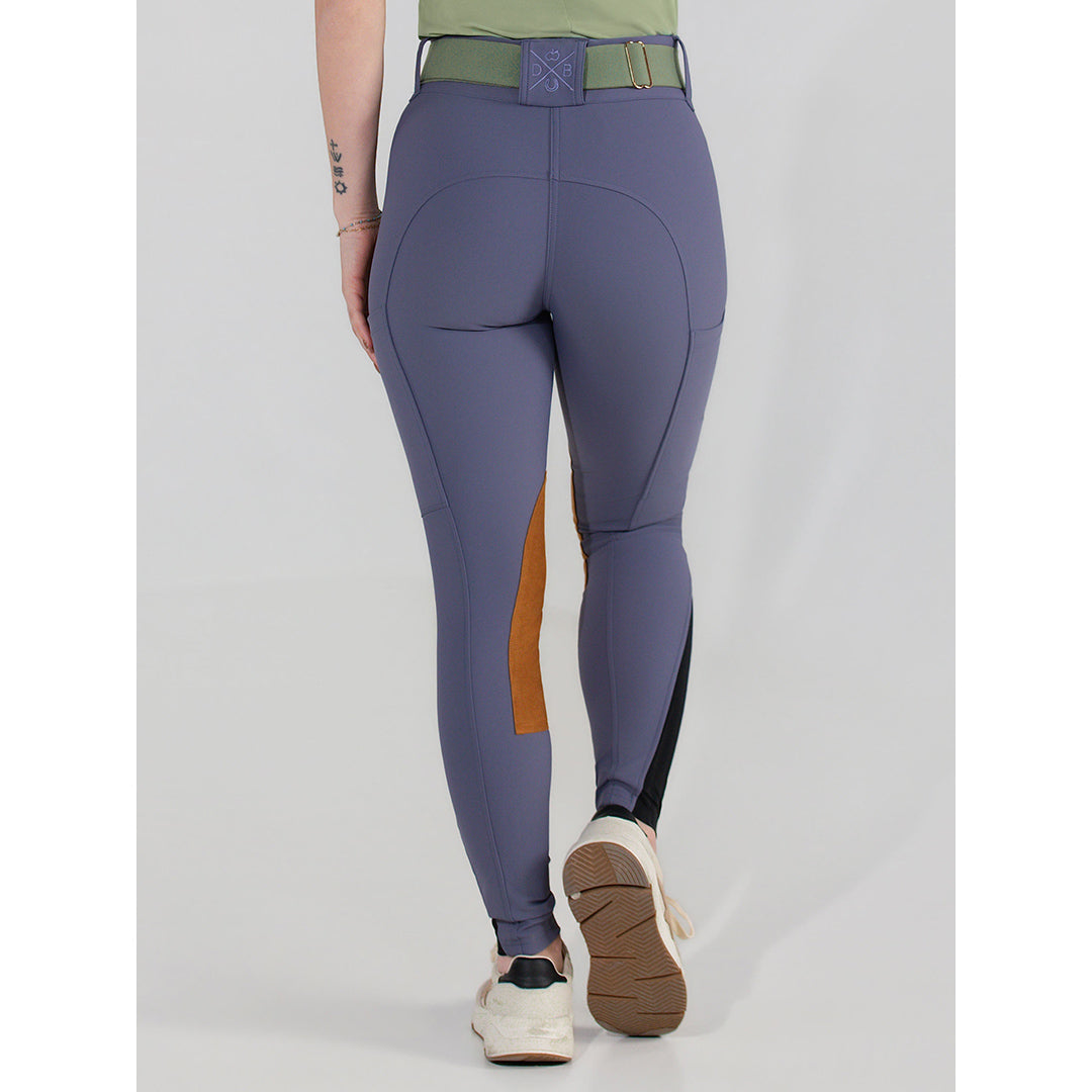 purple riding pants with a brown patch
