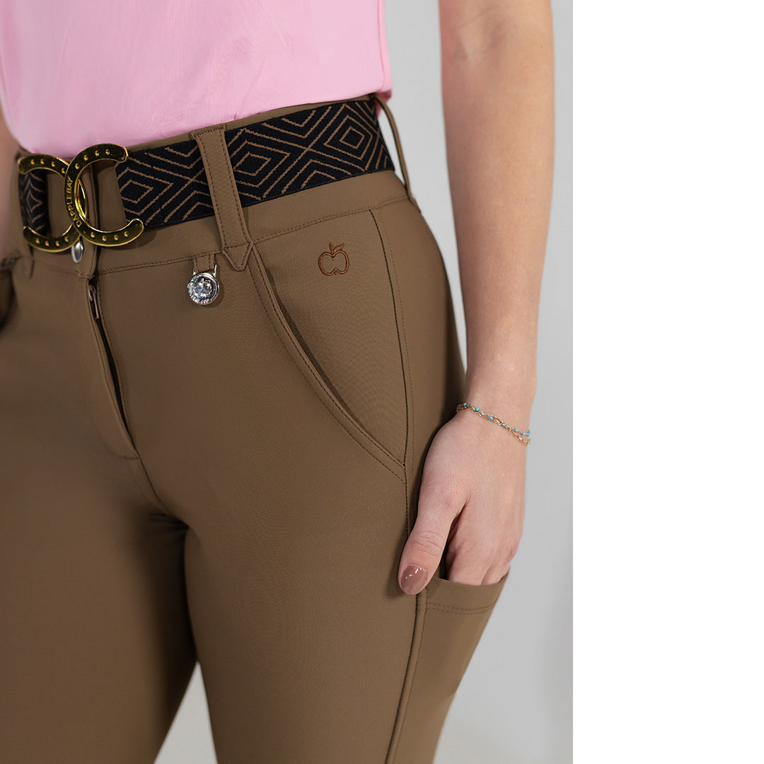 Brown equestrian pants with orange patches 