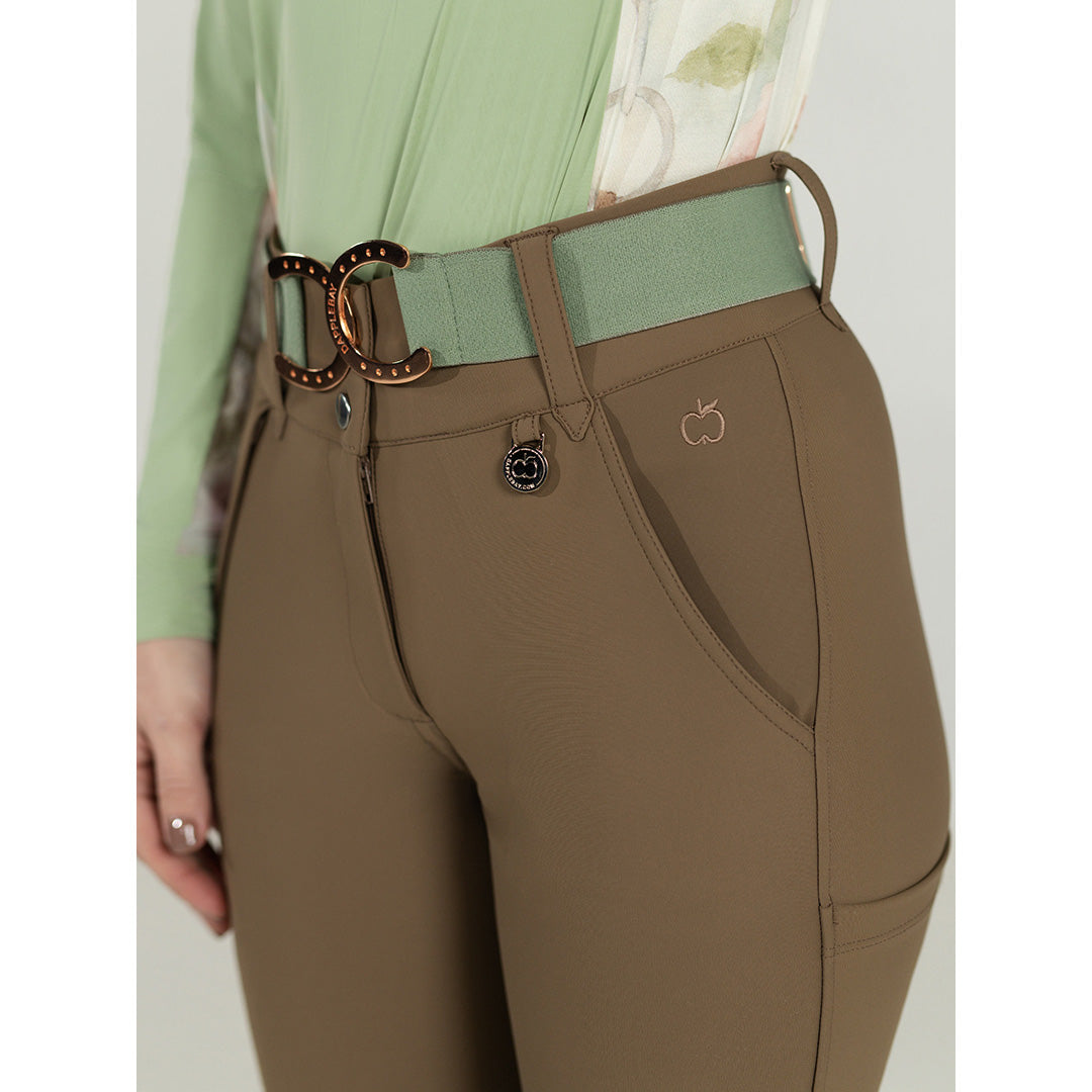 Brown pants with a green belt and brand logo on a plain background
