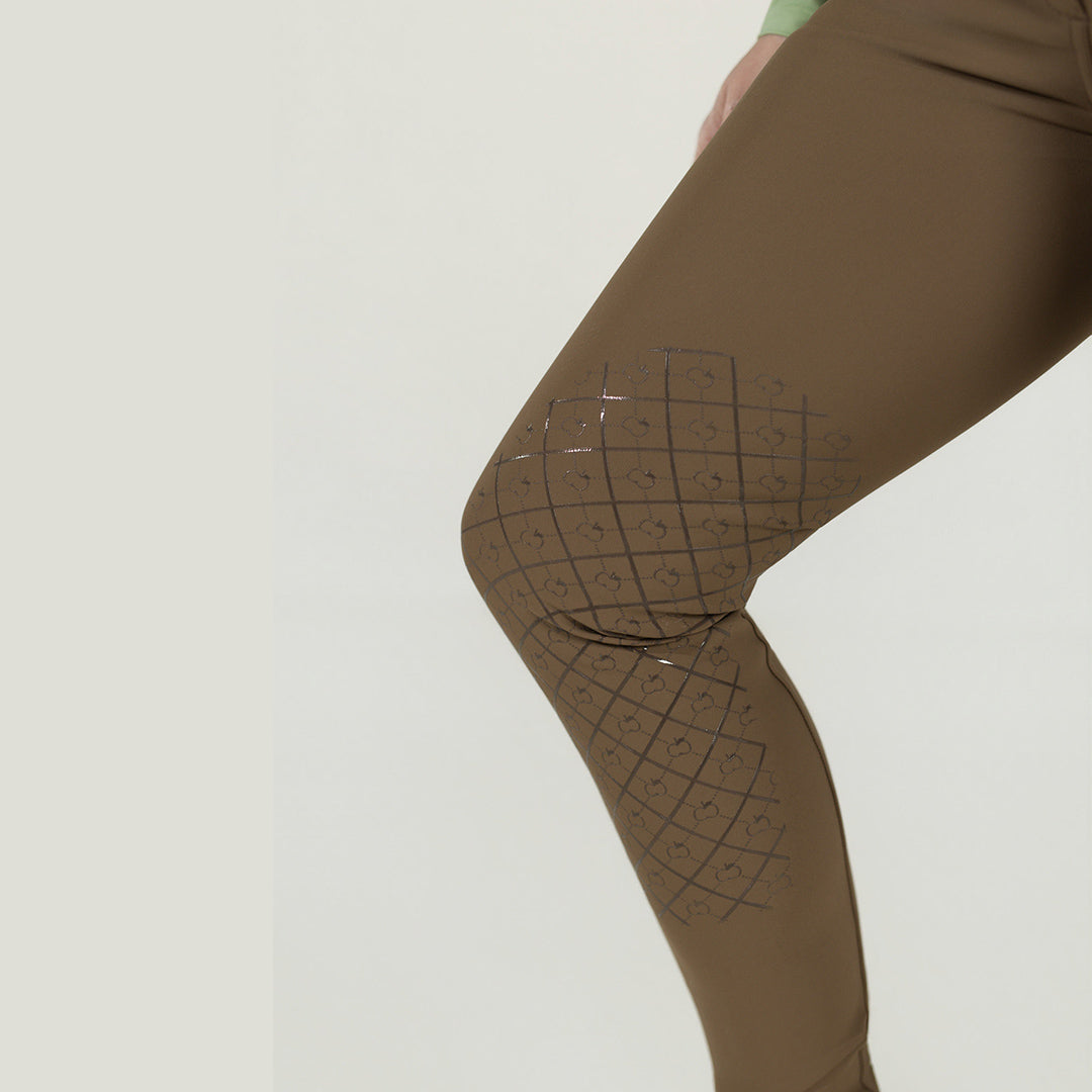 Brown tights with a grid pattern on a light gray background