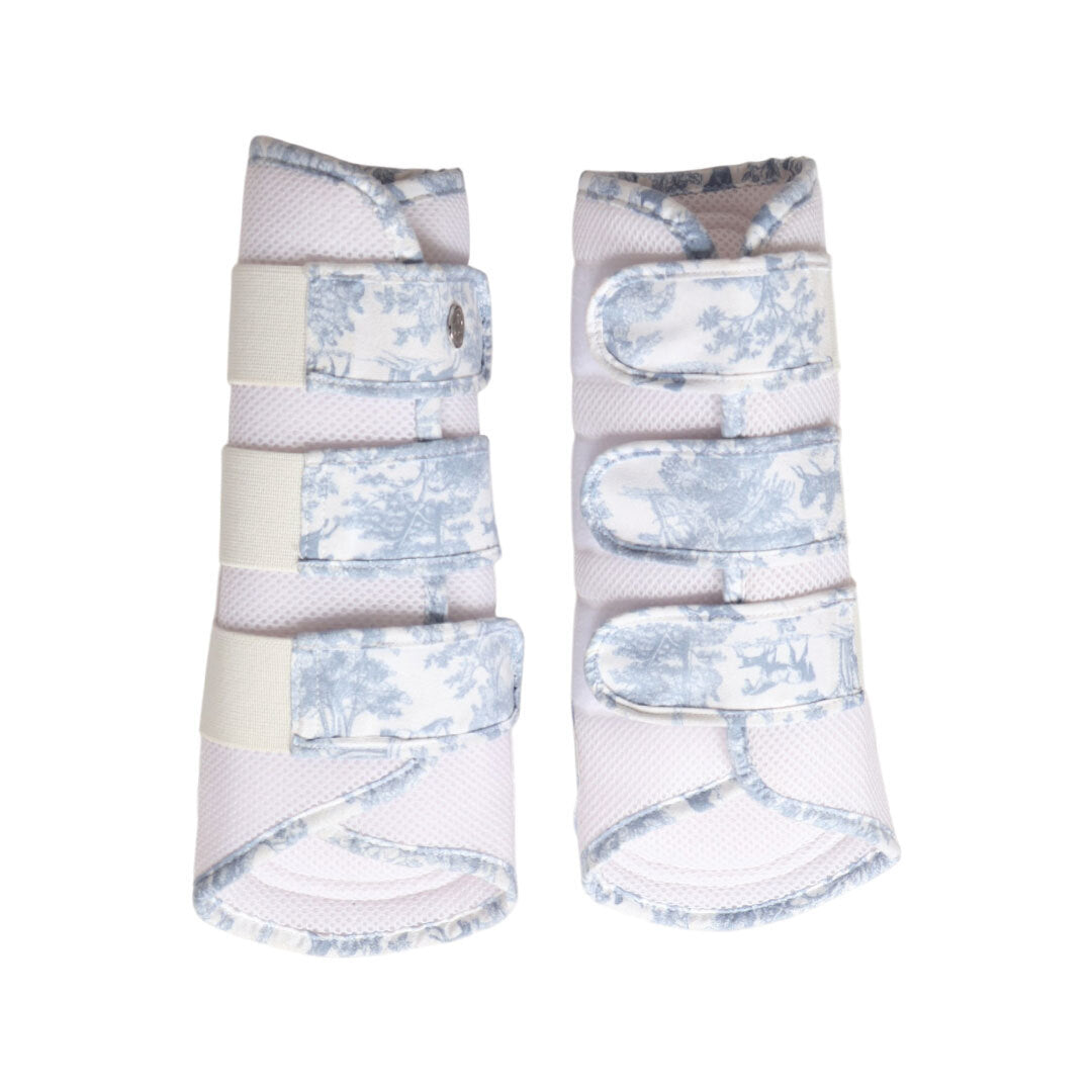 blue and white patterned horse boots