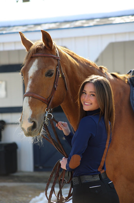 blue long sleeve riding top with sueded trim