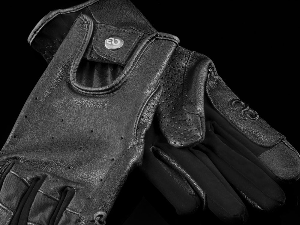 black leather riding gloves