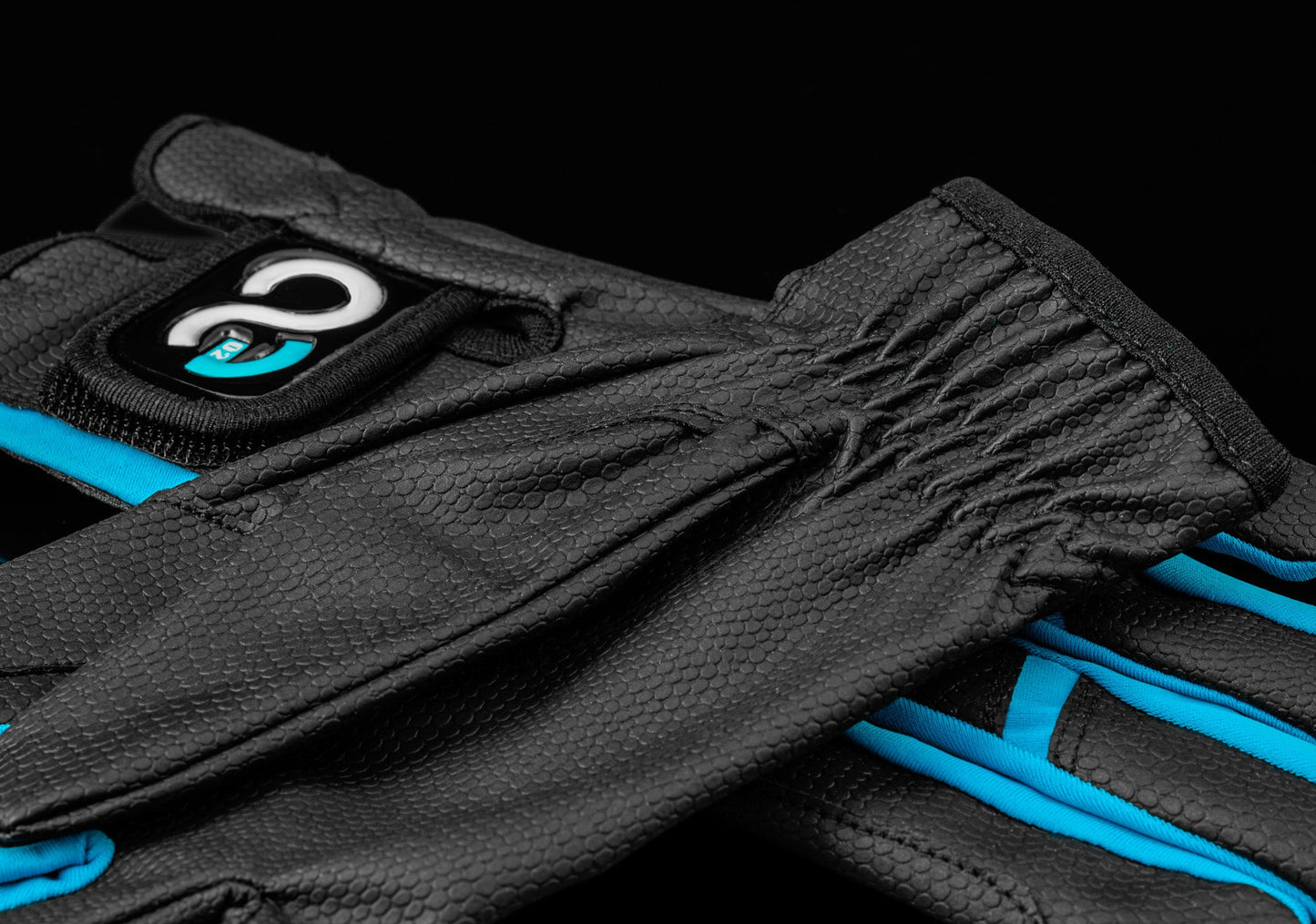 black riding gloves with blue accents