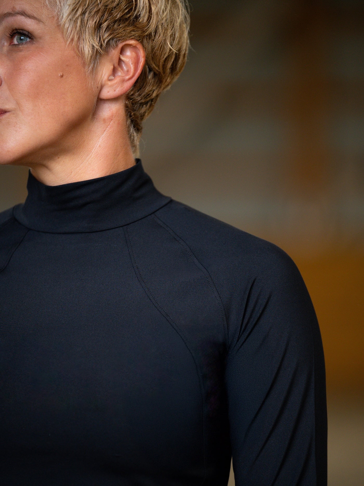 black long sleeve mock neck riding shirt