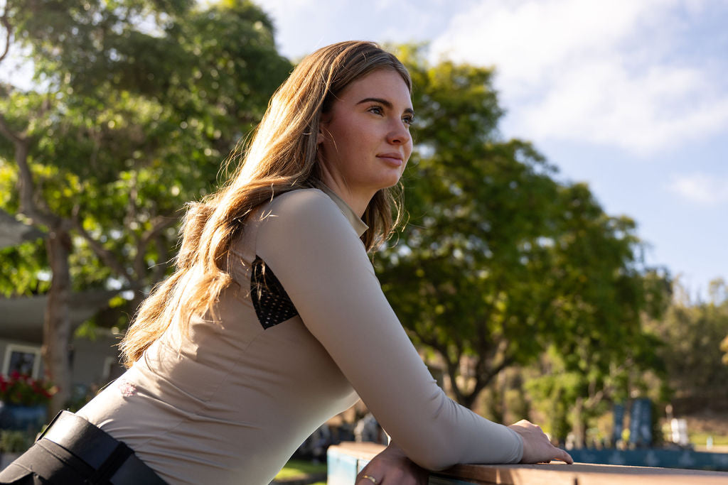 beige turtleneck baselayer riding shirt