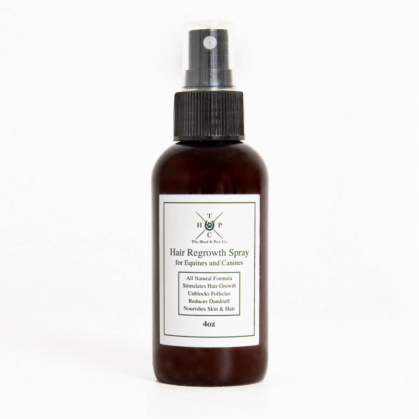Hair regrowth spray bottle with label on a white background