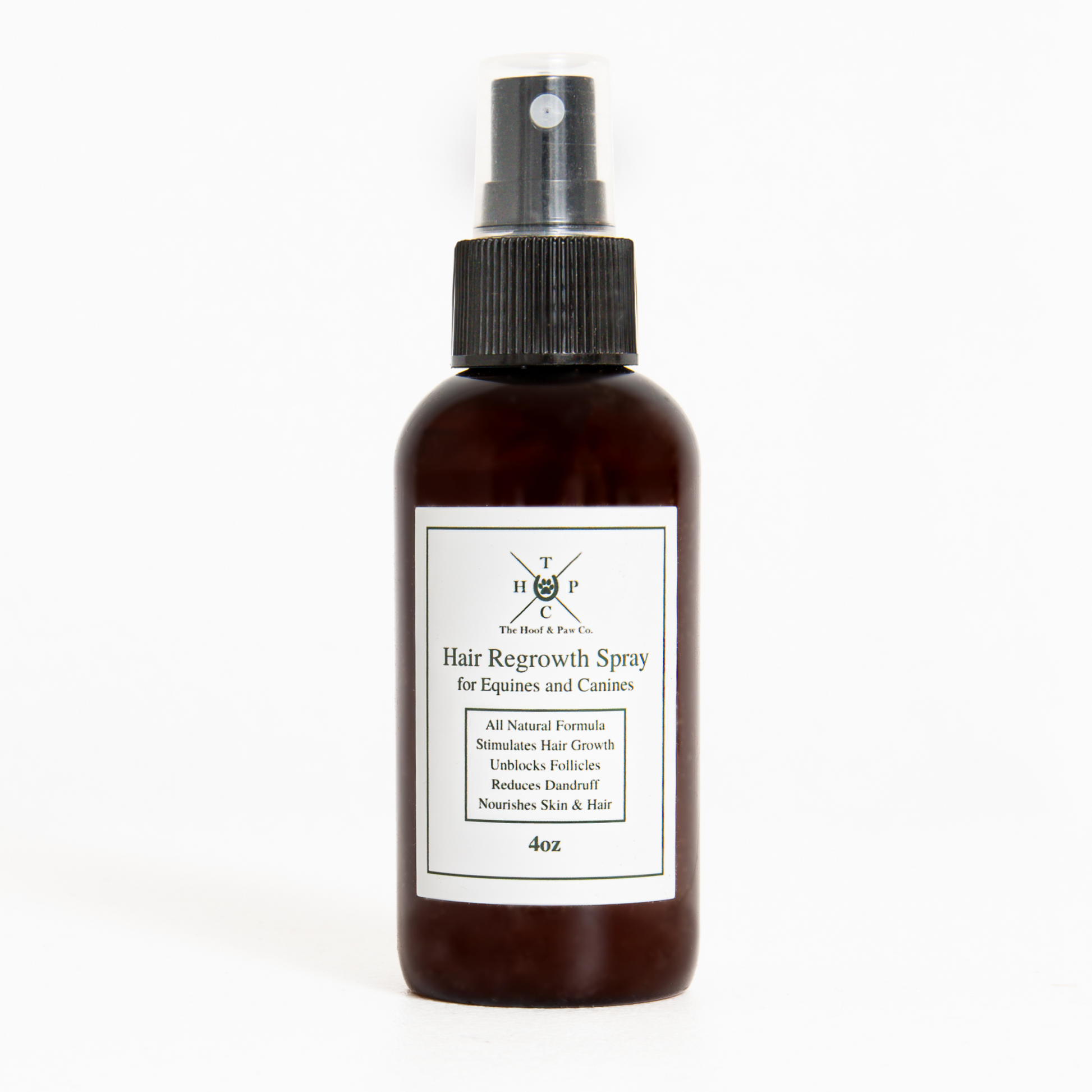 Hair regrowth spray bottle with label on a white background