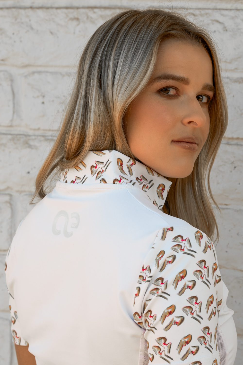 white sun shirt with printed short sleeves