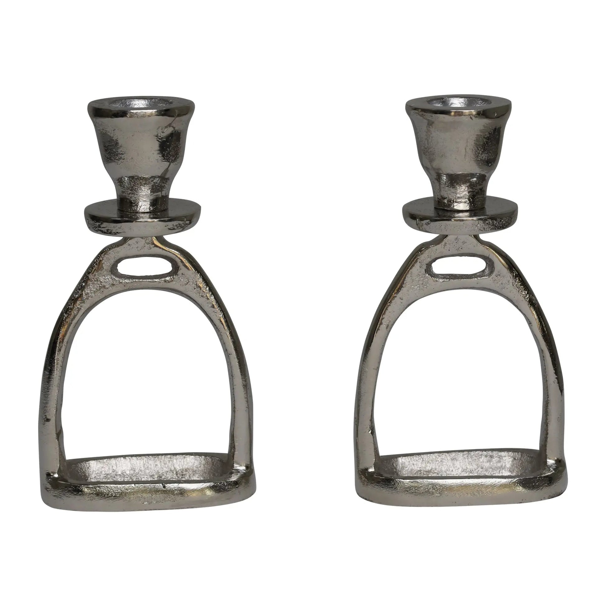 Two metallic candle holders shaped like horse stirrups on a white background