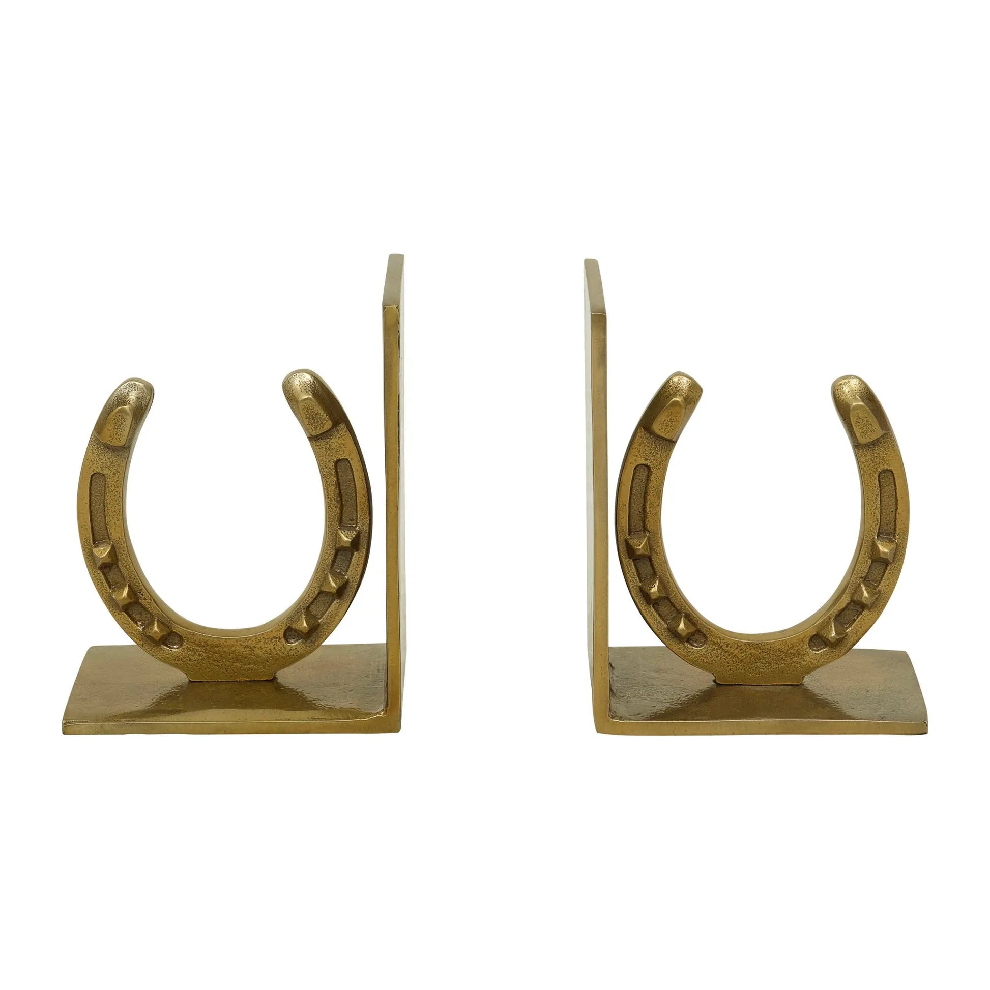Pair of gold horseshoe bookends on a white background
