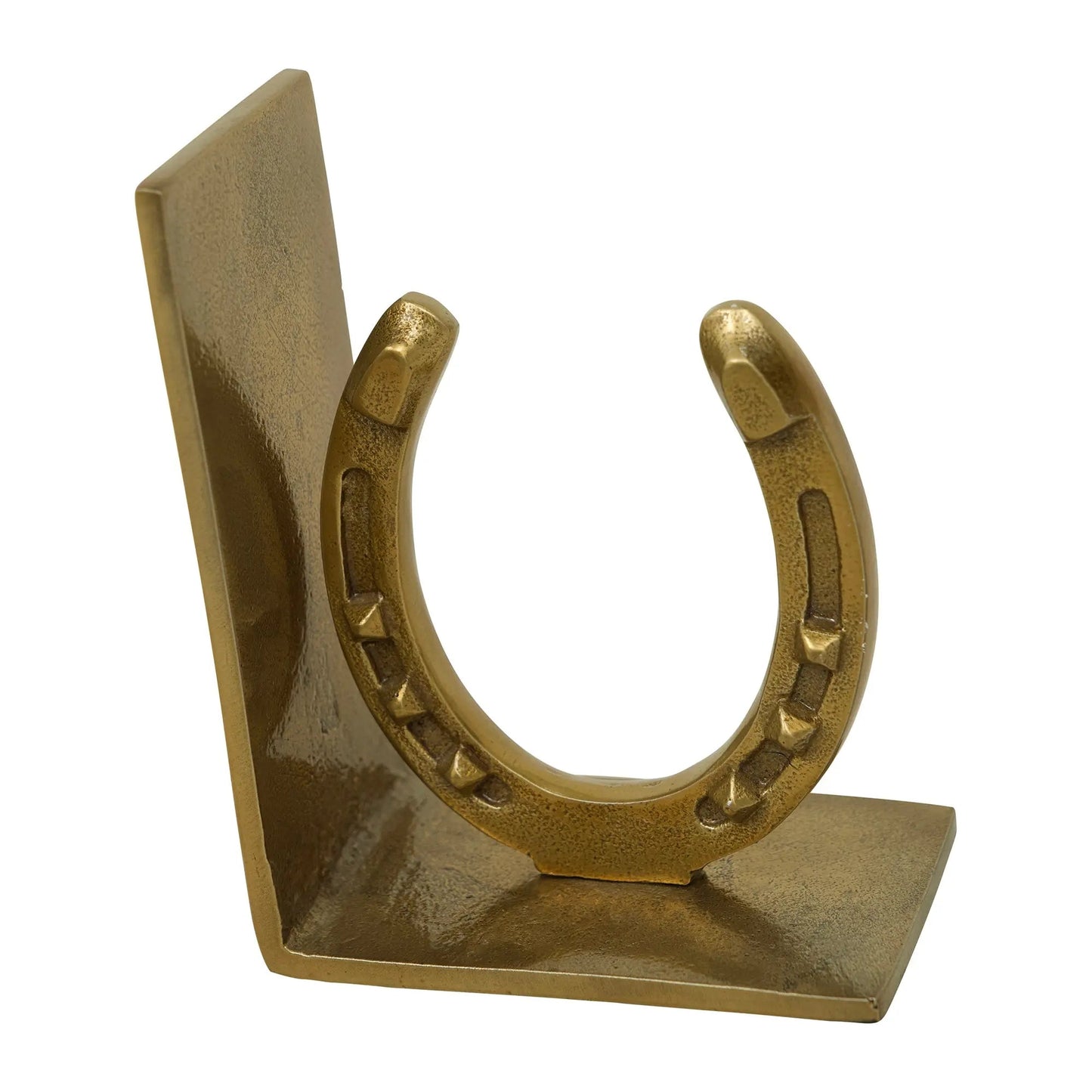 Bronze horseshoe bookend on a white background