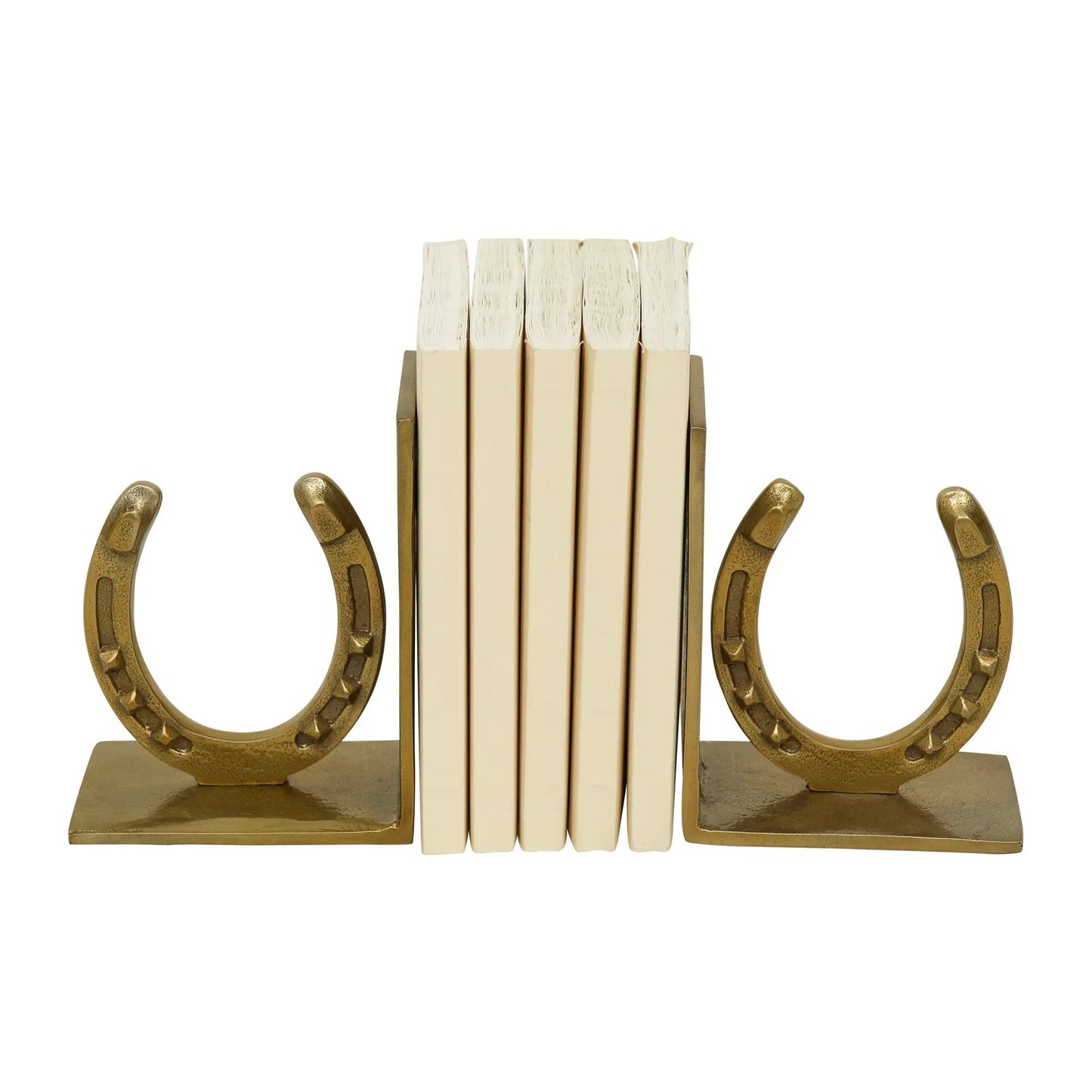 Gold horseshoe bookends holding books on a white background
