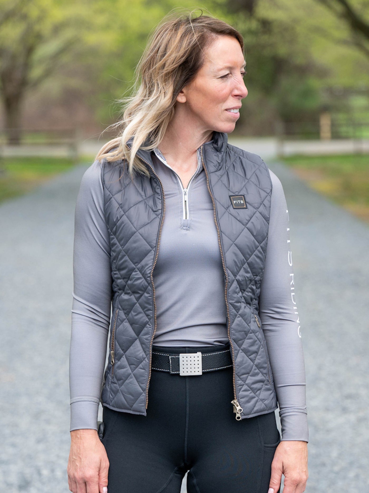 Grey quilted riding vest