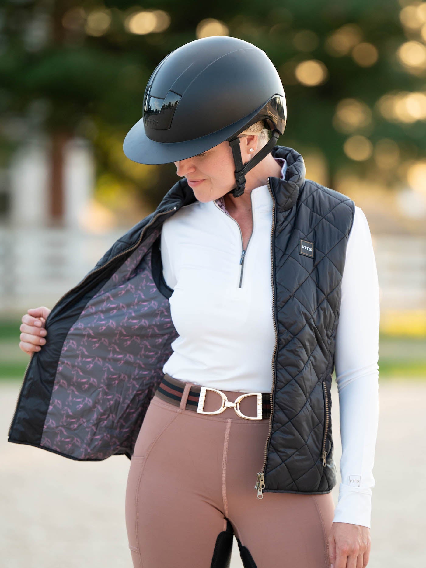 Black quilted riding vest with printed lining