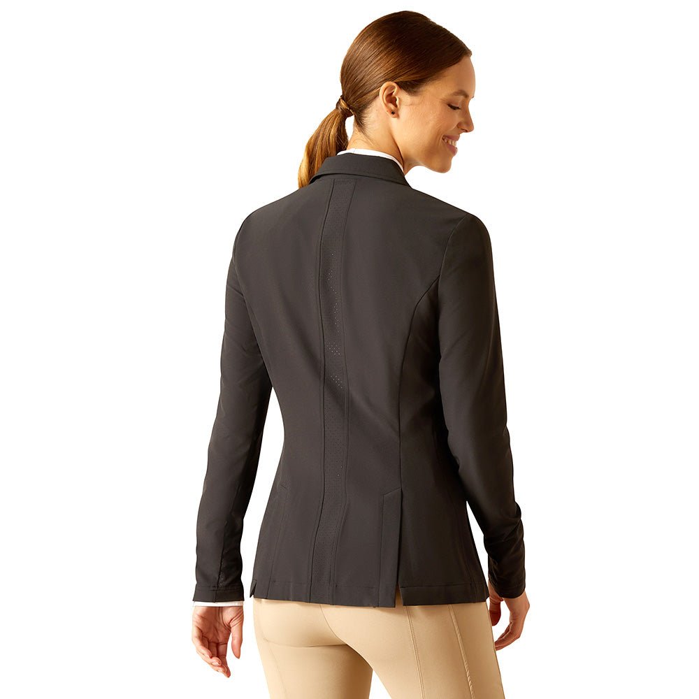 Woman wearing a black equestrian jacket
