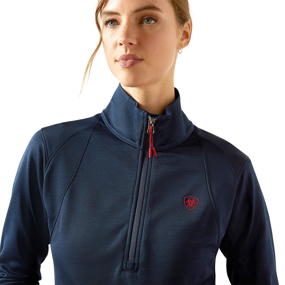 blue long sleeve pullover with red trim