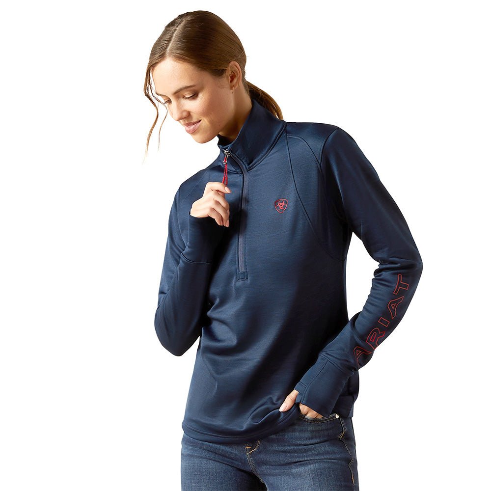 blue long sleeve pullover with red trim