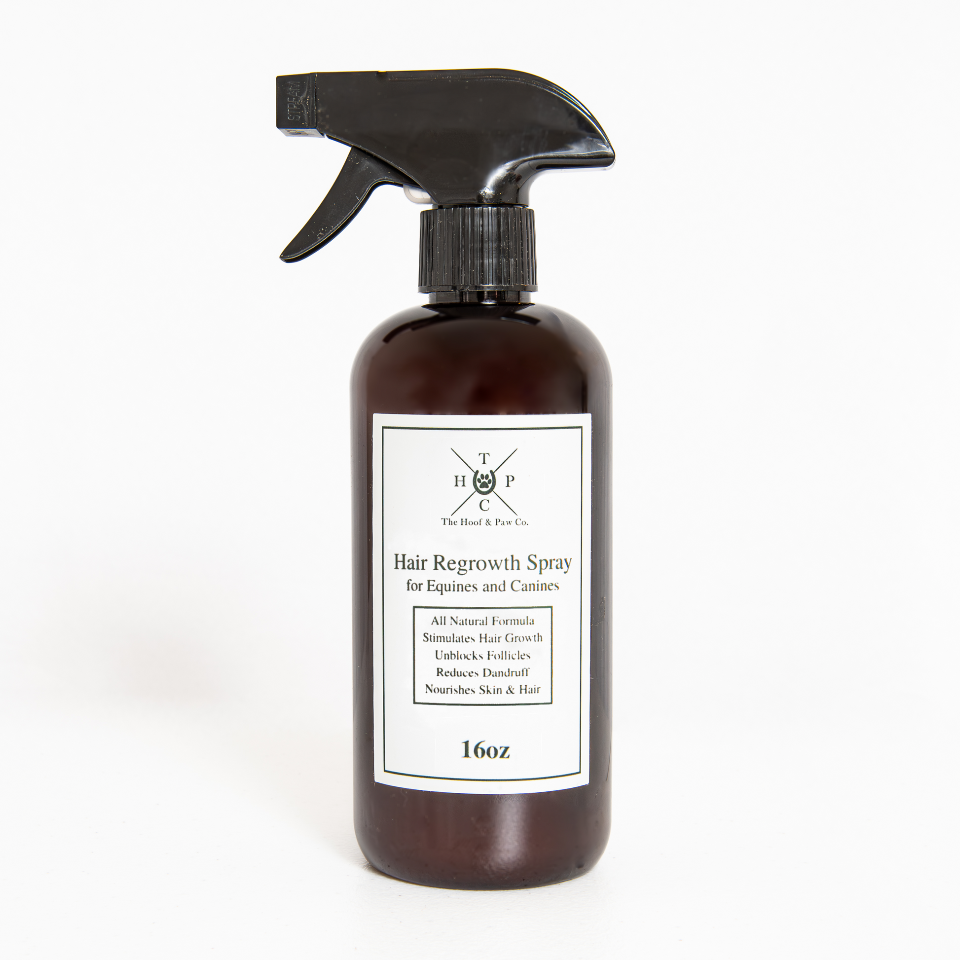Hair regrowth spray bottle with a label on a white background