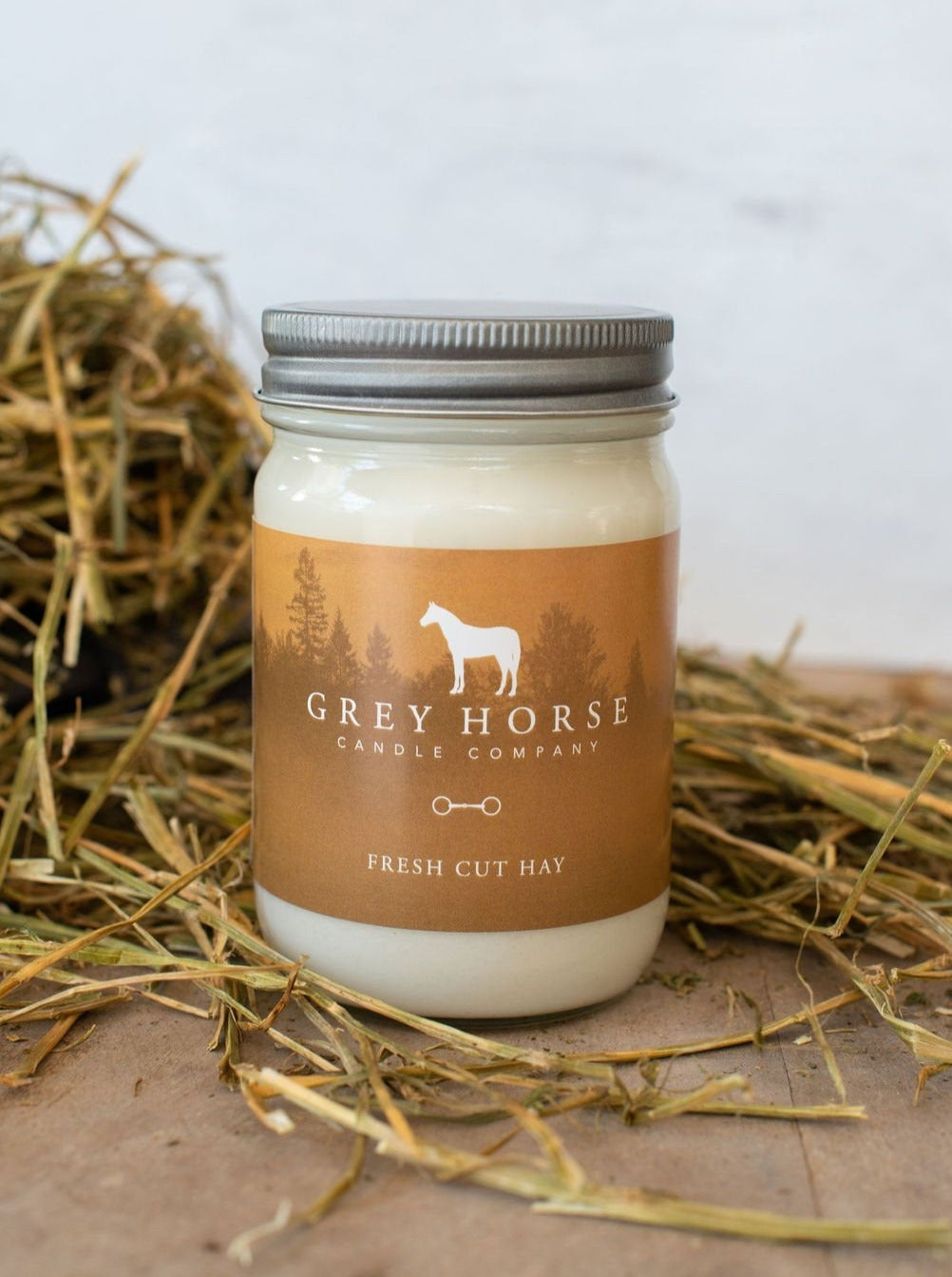 Jar candle with fresh cut hay scent