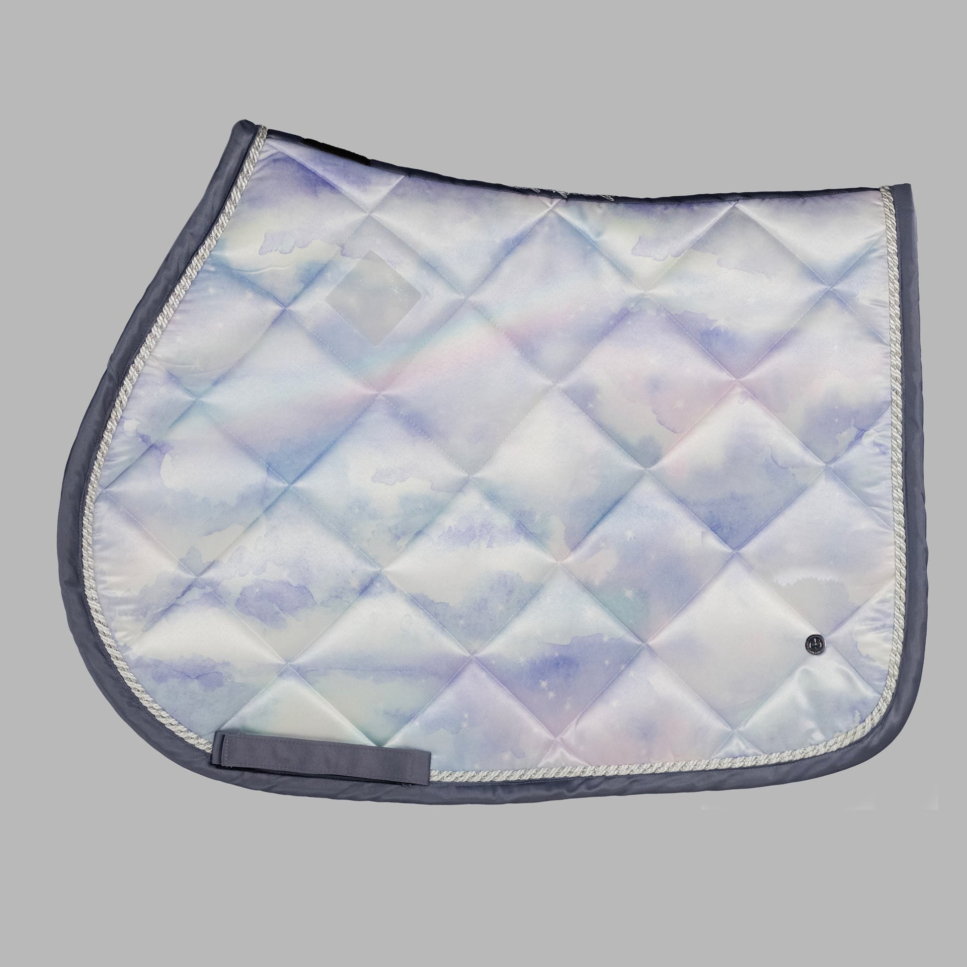 Quilted saddle pad with a diamond pattern on a gray background